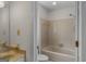 Bathroom featuring a tile shower, a toilet, and neutral walls at 210 Heritage Cir, Mcdonough, GA 30253