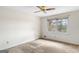 Bedroom featuring neutral walls, carpeted floors, and a ceiling fan at 210 Heritage Cir, Mcdonough, GA 30253