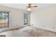 Bedroom with neutral carpet, two windows, and white walls at 210 Heritage Cir, Mcdonough, GA 30253