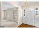 Charming entryway featuring a beautiful hardwood floor and a large window at 210 Heritage Cir, Mcdonough, GA 30253