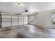 Spacious two-car garage featuring ample room for parking and storage with natural light at 210 Heritage Cir, Mcdonough, GA 30253
