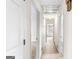 Hallway featuring neutral carpet and white walls at 210 Heritage Cir, Mcdonough, GA 30253