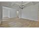 This dining room offers hardwood floors and a modern chandelier, perfect for Gathering gatherings at 6025 Old Timber Trl # 11, Douglasville, GA 30135