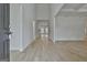 Bright and spacious foyer featuring high ceilings and light wood floors, creating an open ambiance at 6025 Old Timber Trl # 11, Douglasville, GA 30135