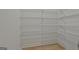 Walk-in pantry features wire shelving and wood floors at 6025 Old Timber Trl # 11, Douglasville, GA 30135
