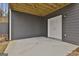 A covered patio is shown, with double doors leading into the basement and gray siding at 6025 Old Timber Trl # 11, Douglasville, GA 30135