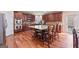 Open-concept kitchen features granite countertops, stainless steel appliances, and large center island at 6142 Golf View Xing, Locust Grove, GA 30248