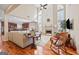 Spacious living room with fireplace, high ceilings, hardwood floors, and abundant natural light at 6142 Golf View Xing, Locust Grove, GA 30248