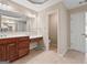 The main bathroom features double sinks and a separate room for the toilet and shower at 6142 Golf View Xing, Locust Grove, GA 30248
