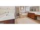 Beautiful main bathroom with a jetted tub, glass shower and double sink vanity at 6142 Golf View Xing, Locust Grove, GA 30248
