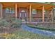 Inviting front entrance with stone walkway and craftsman-style door at 562 Adams Rd, Fayetteville, GA 30214