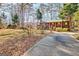 Well-kept front yard featuring a charming home with gazebo at 562 Adams Rd, Fayetteville, GA 30214