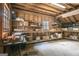 Inside of garage with exposed studs and unfinished look, ready for your creativity at 562 Adams Rd, Fayetteville, GA 30214