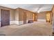 The room features a textured wall, decorative trim, and multiple access points at 562 Adams Rd, Fayetteville, GA 30214
