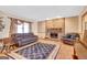 Inviting living room showcasing a fireplace, plush seating, and an open layout at 562 Adams Rd, Fayetteville, GA 30214
