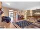 Cozy living room featuring a fireplace, plush seating, and plenty of space for entertaining at 562 Adams Rd, Fayetteville, GA 30214