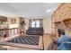 Spacious living room with a brick fireplace, comfortable seating, and stylish accents at 562 Adams Rd, Fayetteville, GA 30214
