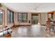 Bright sun room with tile floor and views of the outside deck at 562 Adams Rd, Fayetteville, GA 30214