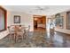 Inviting sun room with natural light, tile flooring, and open view of the adjacent dining room at 562 Adams Rd, Fayetteville, GA 30214