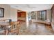 Cozy sun room with beautiful views, tile floors, and plenty of natural light at 562 Adams Rd, Fayetteville, GA 30214