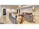 Expansive living room featuring multiple seating areas, elegant decor, and bright lighting at 337 Lakeshore Dr, Berkeley Lake, GA 30096
