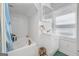 Bathroom with tile walls, bathtub, and vanity at 1444 Norman Berry Dr, East Point, GA 30344