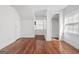 Bright bedroom featuring hardwood floors, natural light, and closet space at 1444 Norman Berry Dr, East Point, GA 30344