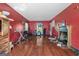 Bright living room with hardwood floors, fireplace and an open layout leading to an outdoor area at 1444 Norman Berry Dr, East Point, GA 30344