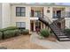 Charming condo building featuring tidy landscaping and eye-catching red doors at 555 Windchase Ln, Stone Mountain, GA 30083