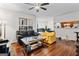 Spacious living room with hardwood floors and plenty of natural light at 555 Windchase Ln, Stone Mountain, GA 30083