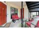 Inviting porch with cozy seating area, perfect for relaxation at 555 Windchase Ln, Stone Mountain, GA 30083