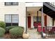 Inviting porch with cozy seating area, perfect for relaxation at 555 Windchase Ln, Stone Mountain, GA 30083