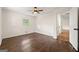 Bedroom with wood floors, a ceiling fan and a hallway view at 256 Butterworth Rd, Canton, GA 30114