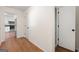 Hallway that leads to the kitchen with updated stainless steel appliances at 256 Butterworth Rd, Canton, GA 30114