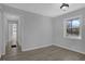 Bright bedroom with hardwood floors, fresh paint, and a window at 3047 Horse Shoe Se Dr, Atlanta, GA 30316