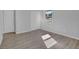 This bedroom features hardwood floors, a bright window, and a double closet at 3047 Horse Shoe Se Dr, Atlanta, GA 30316