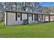 Well-kept single Gathering home with manicured lawn, and a classic and welcoming facade at 3047 Horse Shoe Se Dr, Atlanta, GA 30316