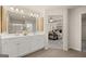 Double vanity bathroom leading into main bedroom, featuring natural light and modern accents at 44 Leggit Dr # 179, Villa Rica, GA 30180