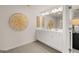 Bathroom with a double vanity, decorative mirror, and plenty of lighting at 44 Leggit Dr # 179, Villa Rica, GA 30180