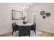 Cozy dining area features a modern chandelier, round marble table, and stylish decor accents at 44 Leggit Dr # 179, Villa Rica, GA 30180