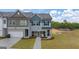 Beautiful townhome with an attached garage and professionally landscaped front yard at 44 Leggit Dr # 179, Villa Rica, GA 30180