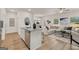 Open-concept kitchen with granite countertops, stainless steel appliances, and island seating at 44 Leggit Dr # 179, Villa Rica, GA 30180