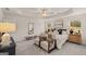 Spacious main bedroom with sitting area, ceiling fan, and large windows at 44 Leggit Dr # 179, Villa Rica, GA 30180