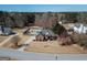 Residential property with a private pool, nestled in a wooded area, offering a serene and secluded setting at 140 Surrey Park Dr, Fayetteville, GA 30215
