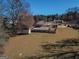 Expansive backyard with inground pool, storage shed, and fenced-in yard in a beautiful neighborhood at 140 Surrey Park Dr, Fayetteville, GA 30215