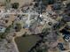 Spacious lot with a pool, bordered by mature trees and situated in a tranquil, established neighborhood at 140 Surrey Park Dr, Fayetteville, GA 30215