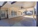 Covered backyard patio featuring an outdoor living space and view of trampoline at 140 Surrey Park Dr, Fayetteville, GA 30215