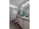 Cozy bathroom with granite counters, modern vanity and a shower with curtain at 140 Surrey Park Dr, Fayetteville, GA 30215