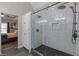 Bathroom shower features rain head, built in shower caddy, and glass doors at 140 Surrey Park Dr, Fayetteville, GA 30215