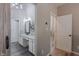 Modern bathroom with granite counters, and vanities, and stand alone shower at 140 Surrey Park Dr, Fayetteville, GA 30215